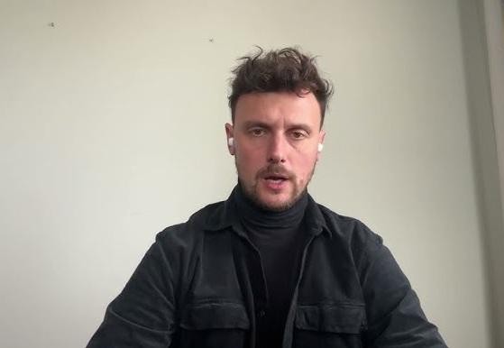 Panorama Warszawy z widokiem na Pałac Kultury i Nauki, symbolizująca miejsce zamieszkania Łukasza Grabarczyka.